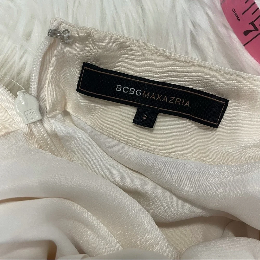 BCBG White Ball Gown w/ statement jewelry & open side slits size 2